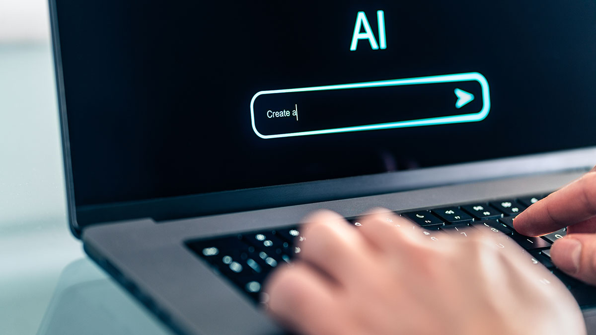 person typing on laptop on generic ai site